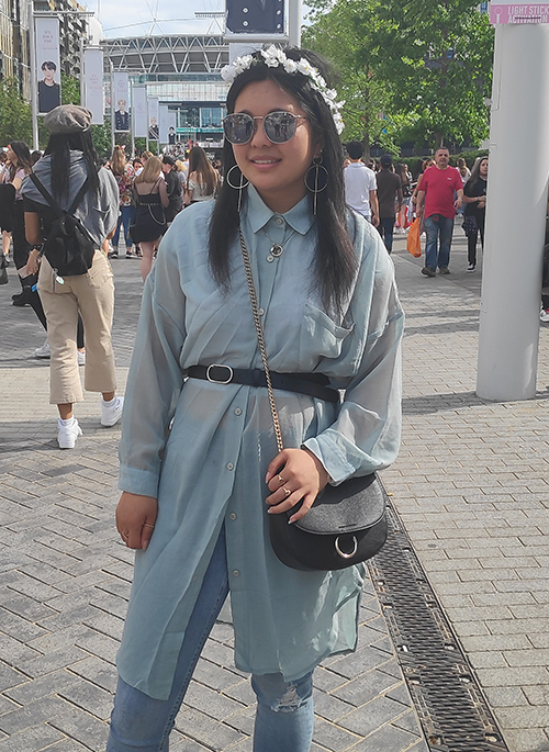 Chauli (Netherlands). This Dutch fan chose jeans and a beautifully draping shirt, complemented by long earrings similar to those BTS members are famous for and a flower crown that is a signature element of the group's concerts.